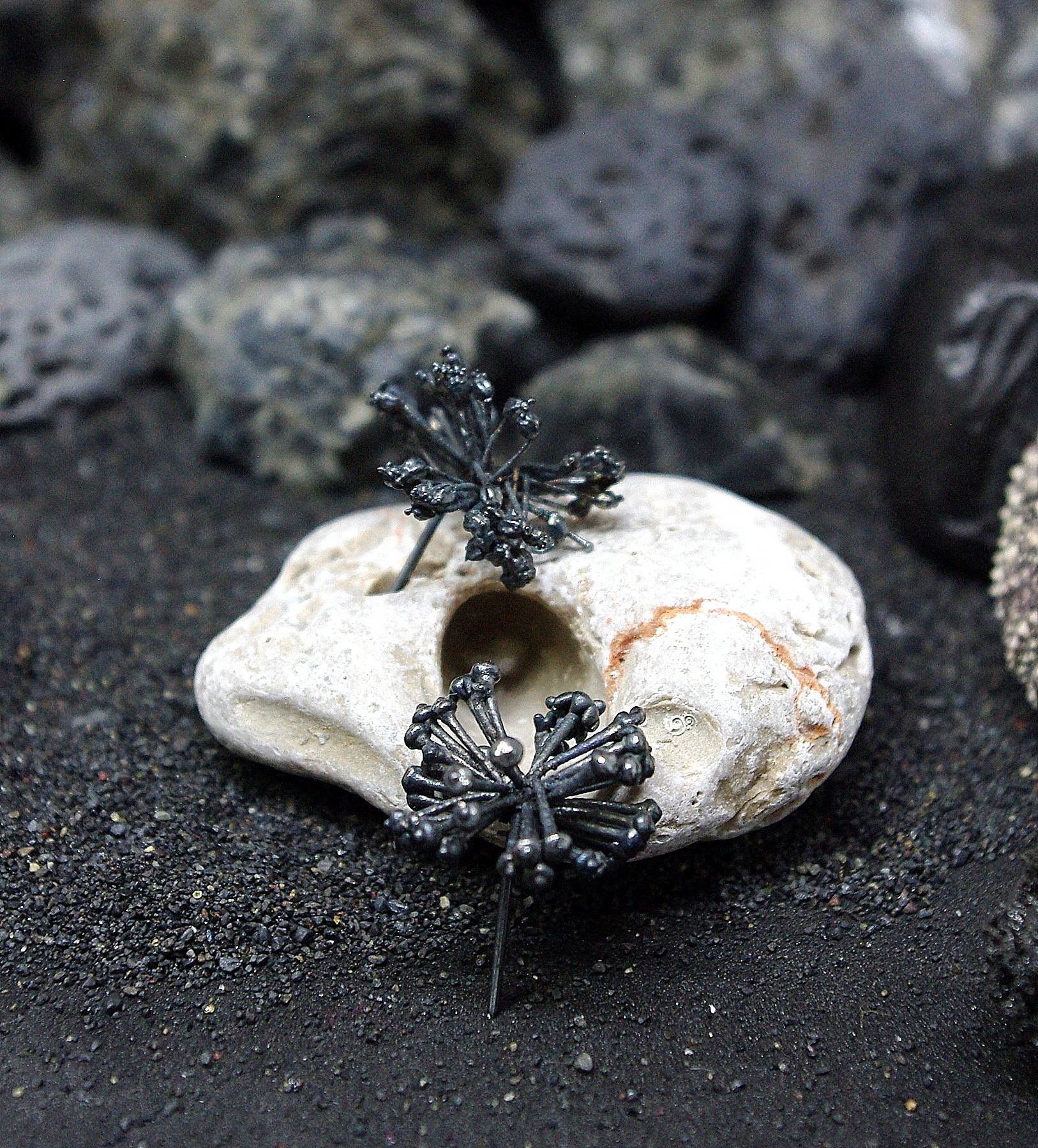 a pair of nicely silver plated flower stud earrings